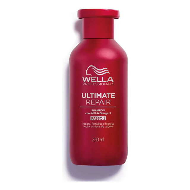 Frasco de 250ml do Shampoo Wella Ultimate Repair na cor vermelha com rótulo frontal detalhando os benefícios de reparação e fortalecimento.