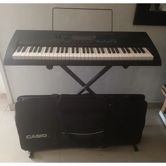 Teclado Casio Modelo Ctk-2100, Con Paral Y Maleta Casio