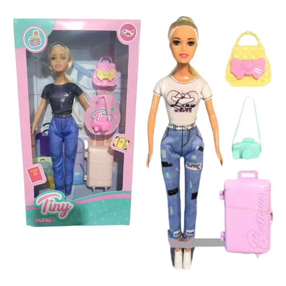 Muñeca Tiny Viajera Con Accesorios