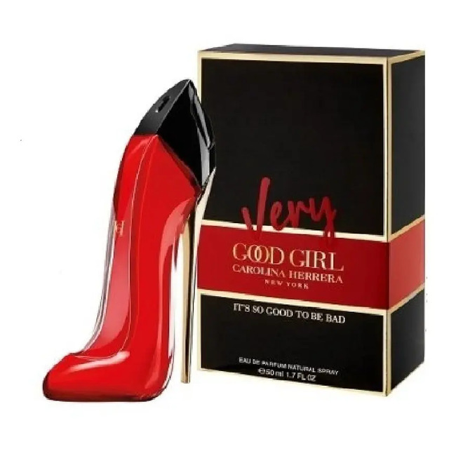 Frasco de perfume Carolina Herrera Very Good Girl em formato de salto agulha vermelho ao lado da caixa original preta e vermelha