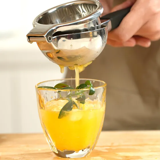 Exprimidor Lima Limon Acero Inoxidable Mango Silicona Prensa