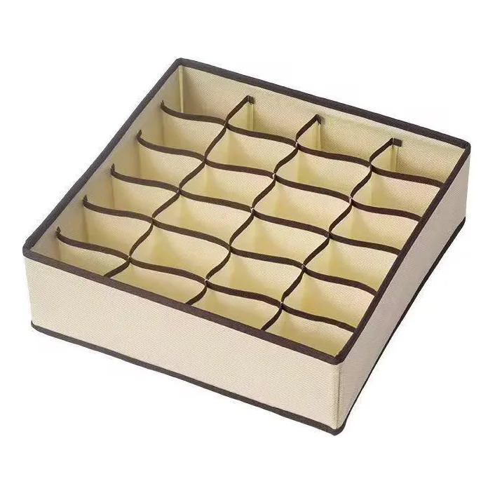 Kit com 2 colmeias organizadoras de roupas íntimas na cor bege, cada uma com 24 divisórias quadradas para organização de peças pequenas.