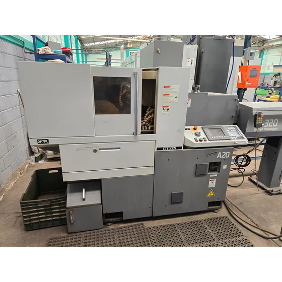 Torno Cnc, Citizen De Alta Producción, Alimentador De Barras Gris