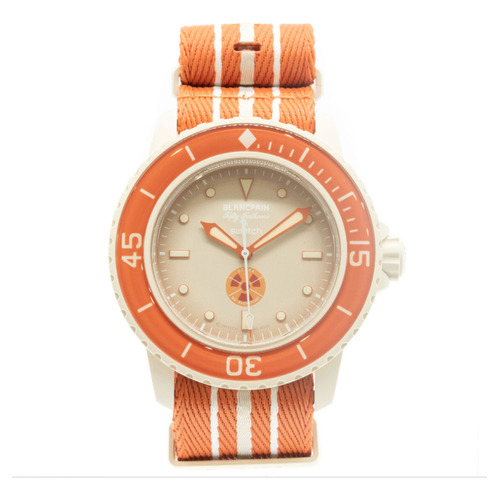 Reloj Swatch X Blancpain Océano Artico Edicion Artic Ocean Color de la correa Naranja Color del bisel Crema Color del fondo Crema