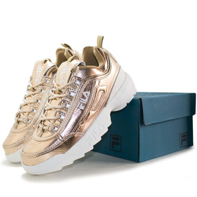 tenis fila feminino dourado