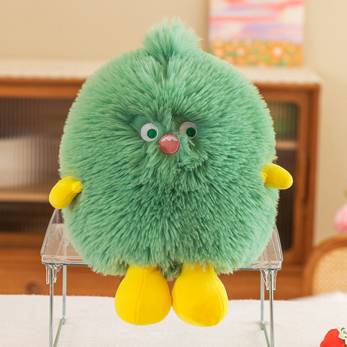 Un Pequeño Animal De Peluche Con Forma De Monstruo Peludo Pa Color Verde