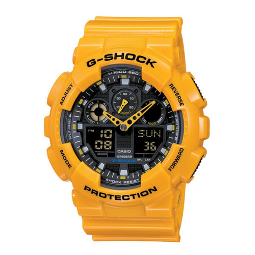 Reloj pulsera Casio G-Shock GA100 de cuerpo color naranja, analógica-digital, para hombre, fondo negro, con correa de resina color naranja, agujas color naranja, dial naranja, subesferas color negro, minutero/segundero naranja, bisel color naranja y hebilla doble
