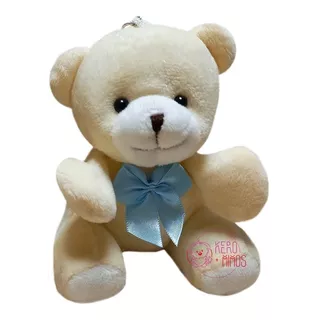 Mini Urso Fofo Creme De Pelúcia Com Laço - 12cm