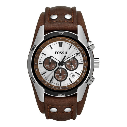 Reloj pulsera Fossil Coachman con correa de cuero color marrón - fondo beige - bisel negro