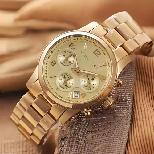 Gold mk watch hotsell