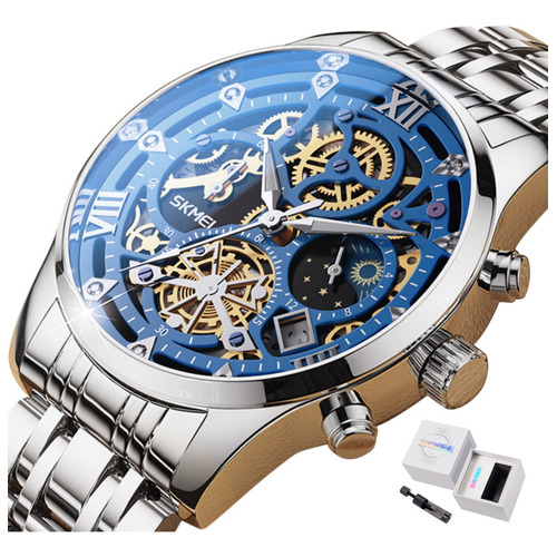Reloj de pulsera Skmei 7039 de cuerpo color plateado, analógico, para hombre, fondo azul y negro color plateado, agujas color blanco, dial blanco, bisel color plateado y mariposa
