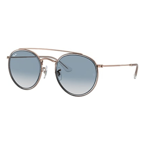 Anteojos de sol Ray-Ban Round Double Bridge Standard con marco de metal color polished transparent, lente light blue de cristal degradada, varilla bronze-copper de metal - RB3647N