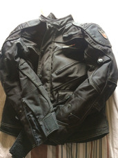 jaqueta motoqueiro proteção coluna