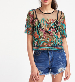 blusa negra transparente con flores