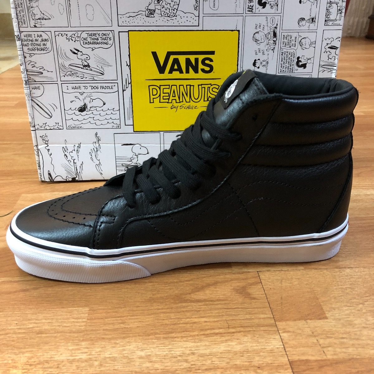 vans negras piel