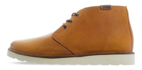 vans negras suela cafe