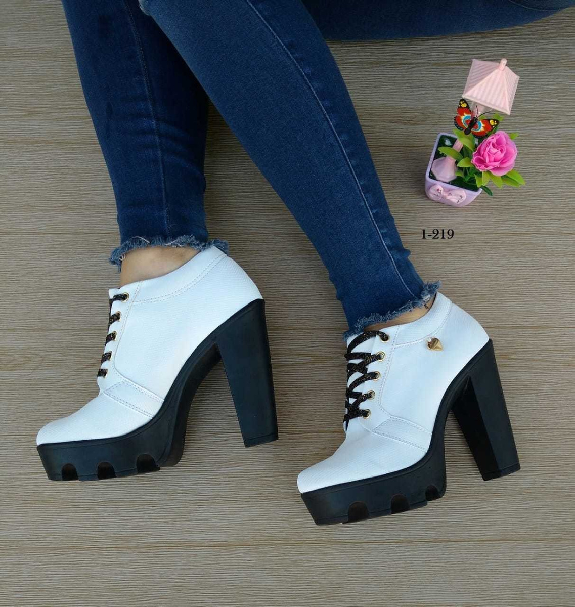 botines altos de moda