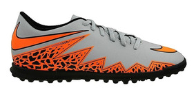 botines nike blancos y naranja