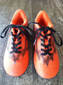 adidas traxion botines