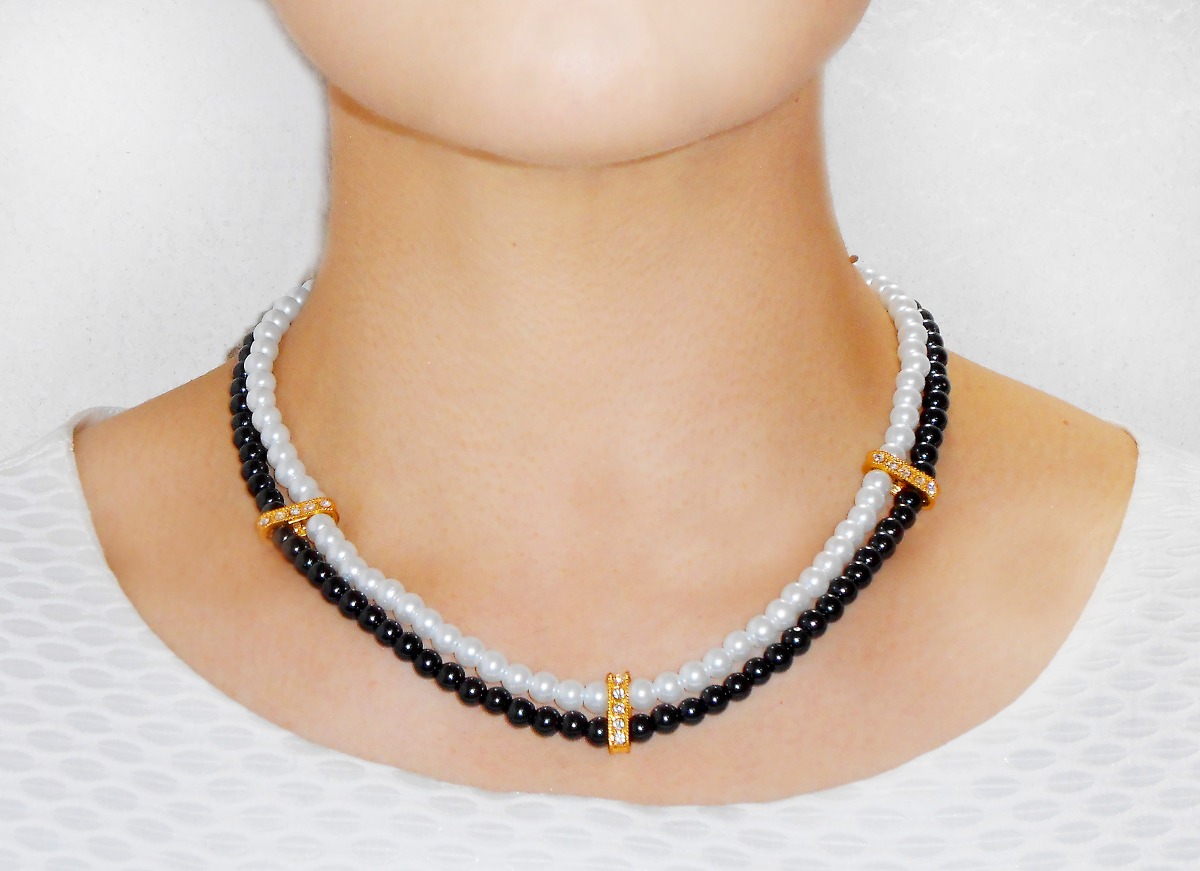 collar y aretes perla negra y blanca con puentes dorados