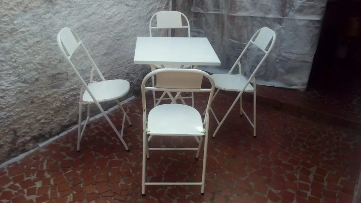 conjunto-mesa-de-aco-dobravel-e-04-cadeiras-seminovo-D_NQ_NP_628140-MLB28649347941_112018-F.webp