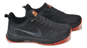 nike negro con naranja