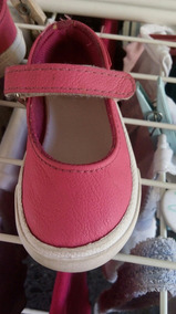 zapatillas puma con moño rosa