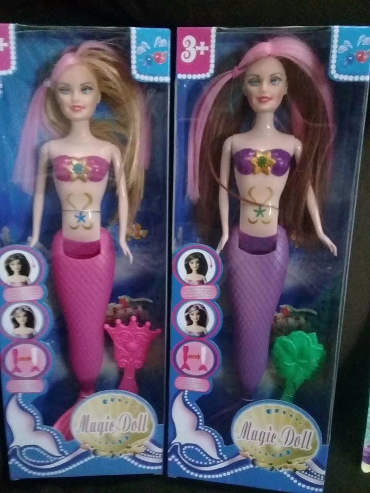 muñeca sirena que cambia de color