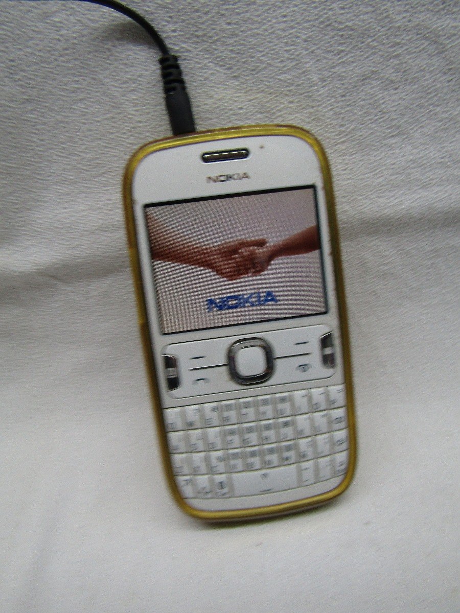 nokia asha 302- caja manual accesorios + funda como nuevo ! Cargando zoom.