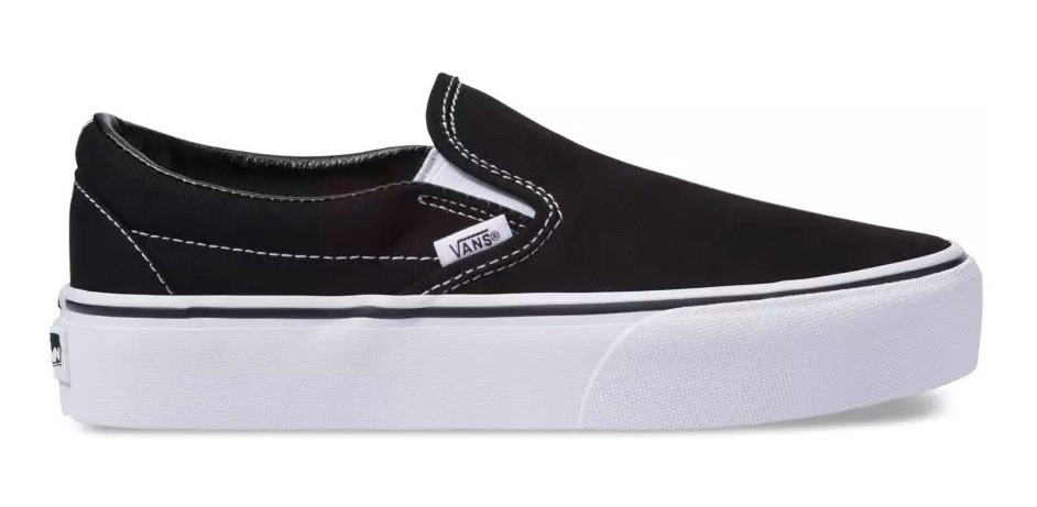 vans negras slip on