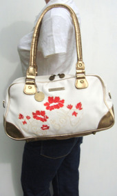 bolsos reebok dorados