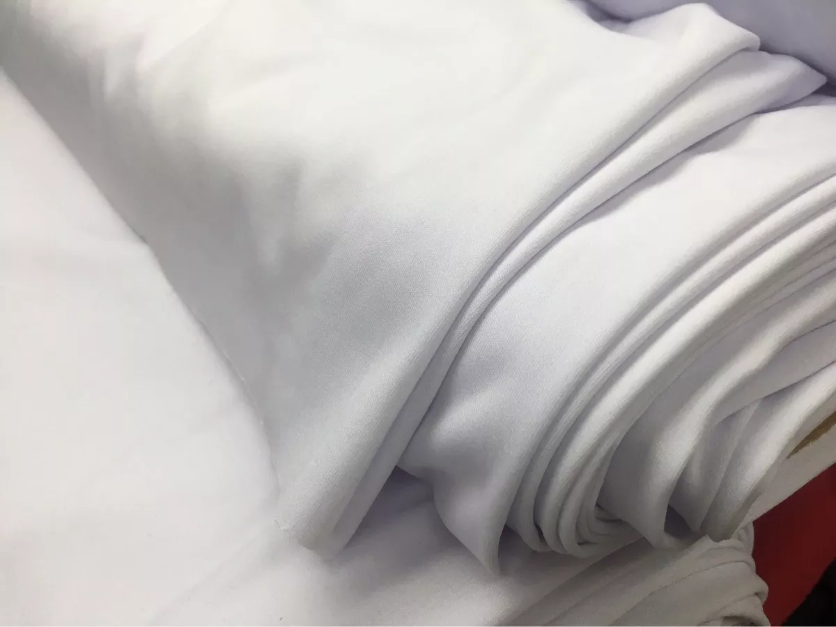 Tela elástica blanca por metro para la creación de ropa: leggins, pantalones