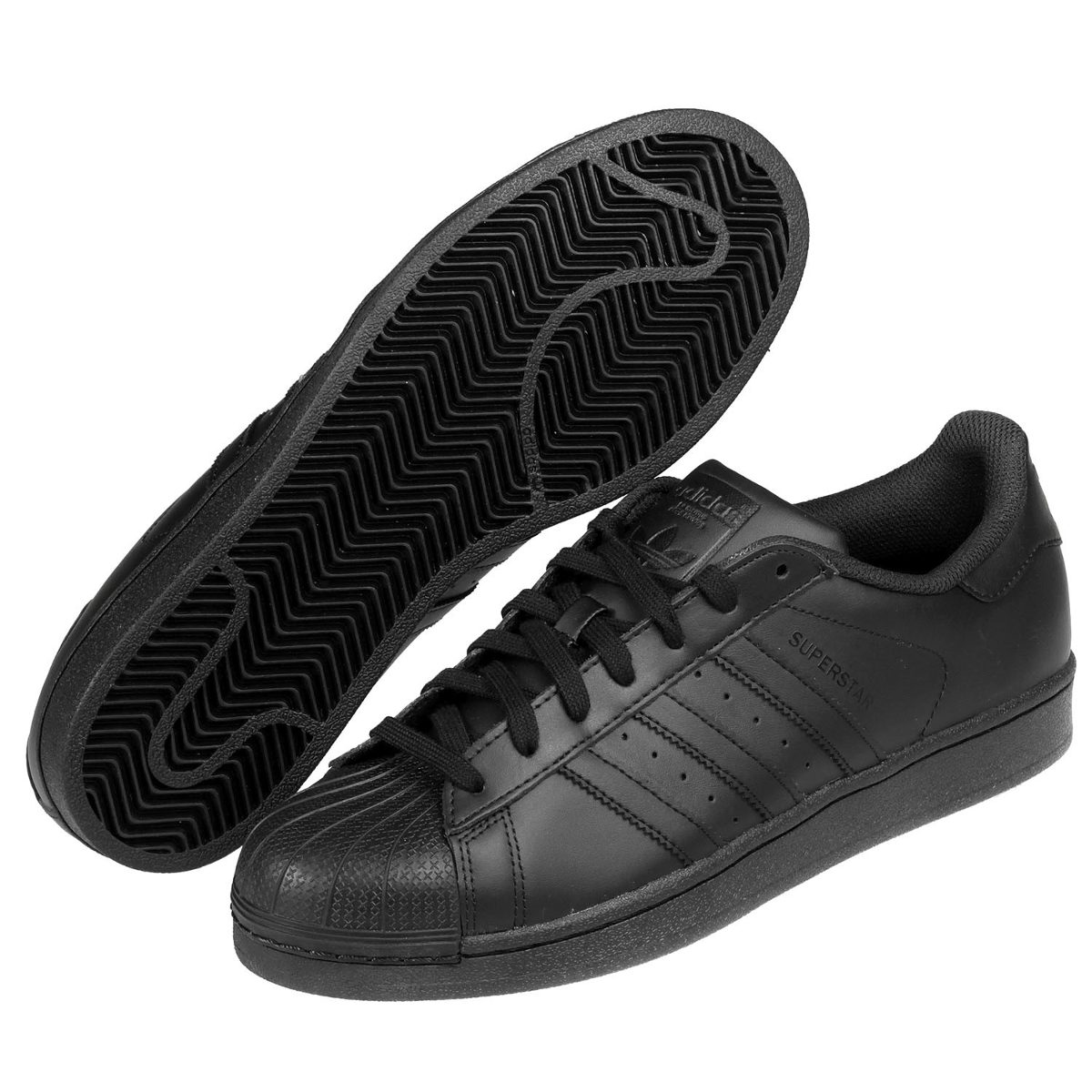 adidas negros de piel