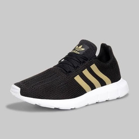 adidas dorado con negro