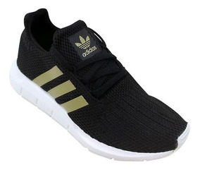 adidas mujer negro con dorado