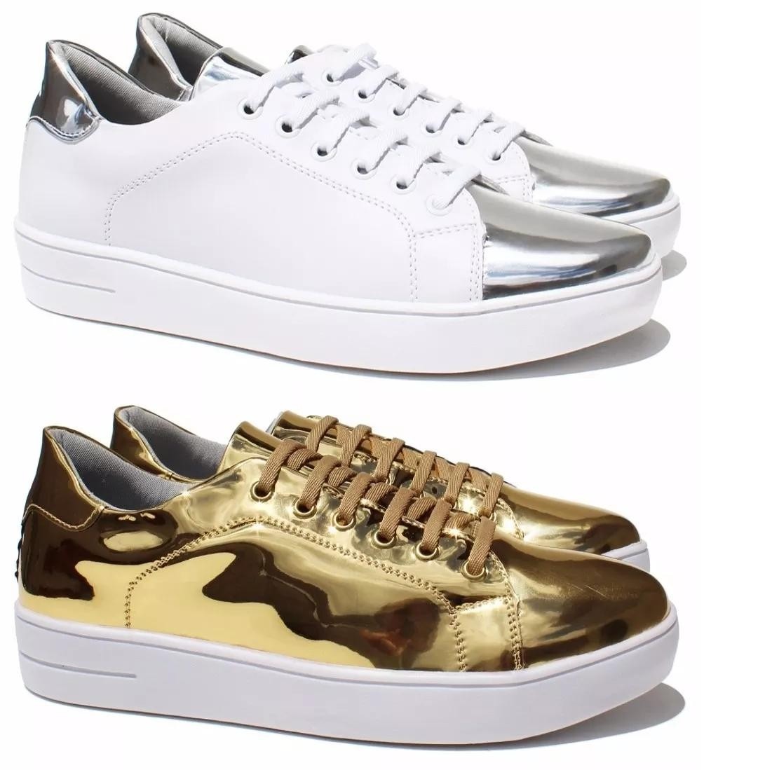 tenis dourado e branco