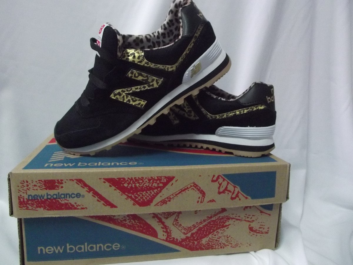 tenis new balance feminino preto com onça