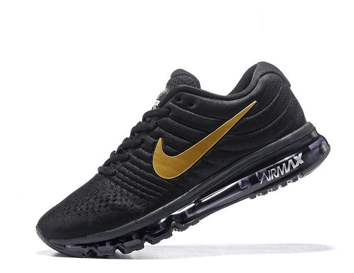 zapatos nike negros con dorado