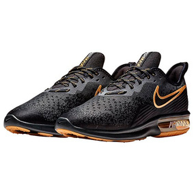 tenis nike dorados hombre