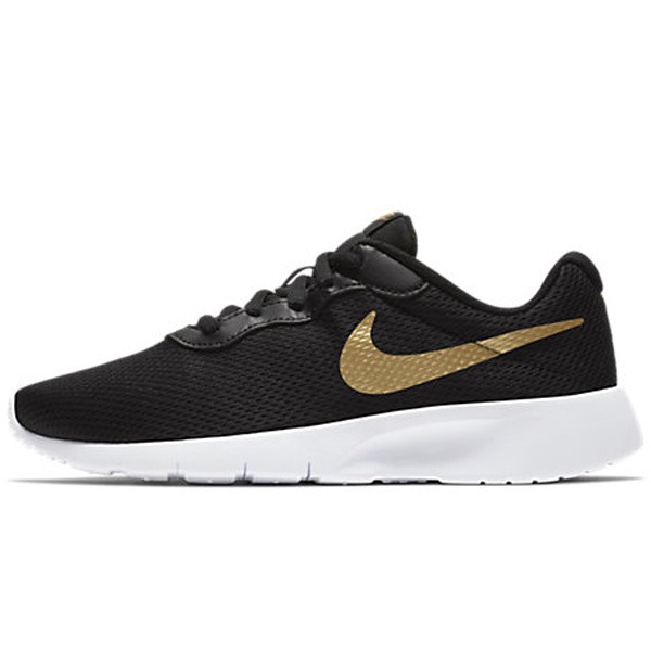 tenis nike dorados con negro