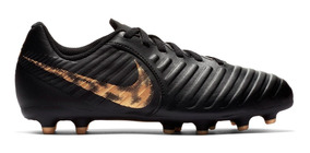 nike tiempo negros con dorado