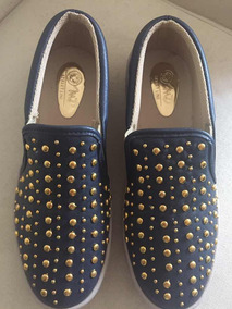 vans snoopy dorados