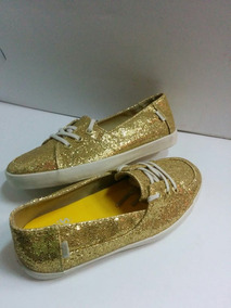 vans snoopy dorados