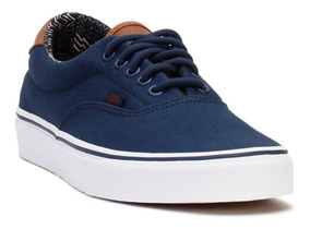 vans azules con cafe