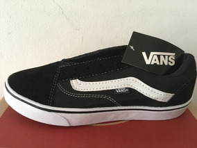 vans negras suela caramelo