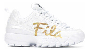 zapatillas fila blancas y doradas