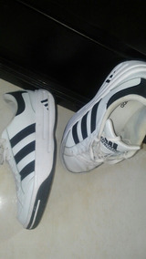 adidas Guantes blancas