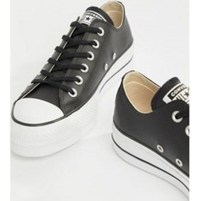 converse negras plataforma cuero