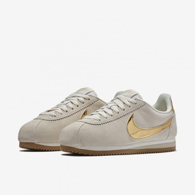 nike cortez doradas mujer