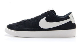 nike negras suela marron